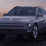 2025 hyundai kona electric parked with sunset in the back